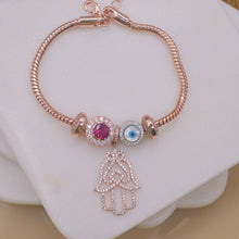 Load image into Gallery viewer, Hamsa Ruby Diamond Evil Eye Royal Charm Bracelet - Rose Gold Polish
