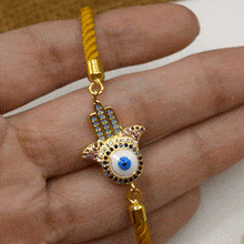 Load image into Gallery viewer, White Evil Eye Hamsa Hand Bracelet in Mustard Yellow Band - Gold
